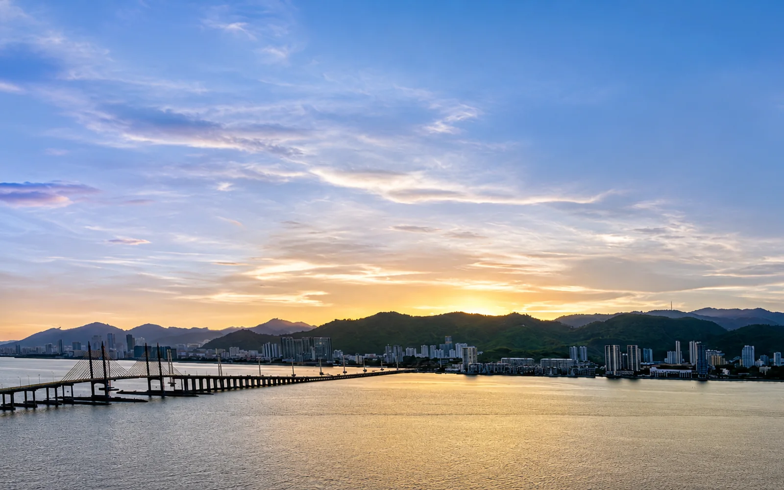 Penang Bridge and island skyline at sunset