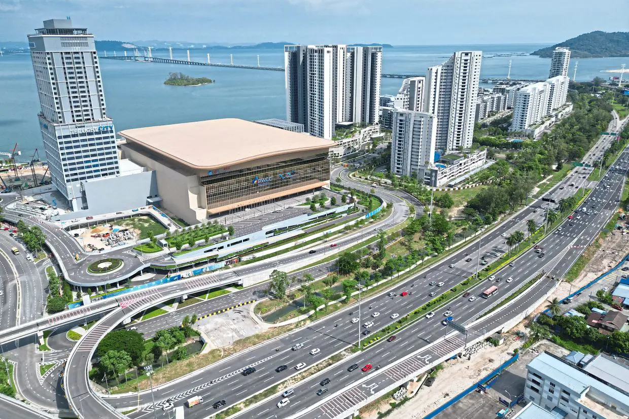 Real aerial photograph showing waterfront roads and Penang Bridge access context